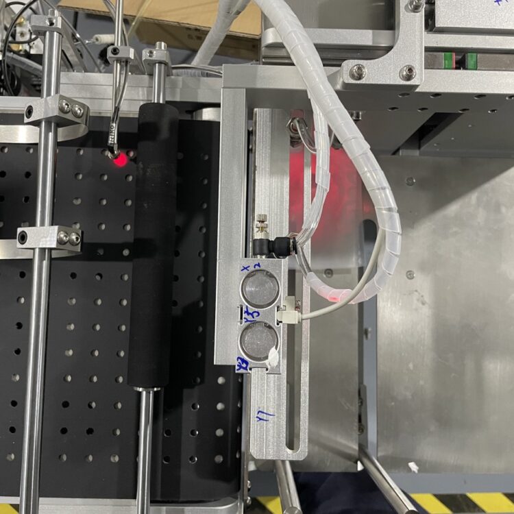 Product sensor A of the top labeler